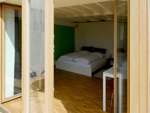 Ferienwohnung Hübschle tesisinde bir odada yatak veya yataklar