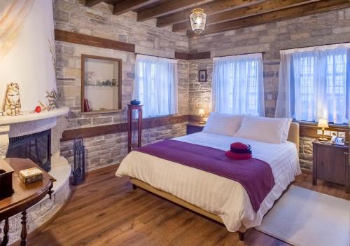 Postel nebo postele na pokoji v ubytování Gioraldi Art Hotel