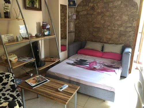 A bed or beds in a room at apartemento rural