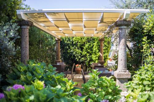 Сад в Hotel Villa Tiziana