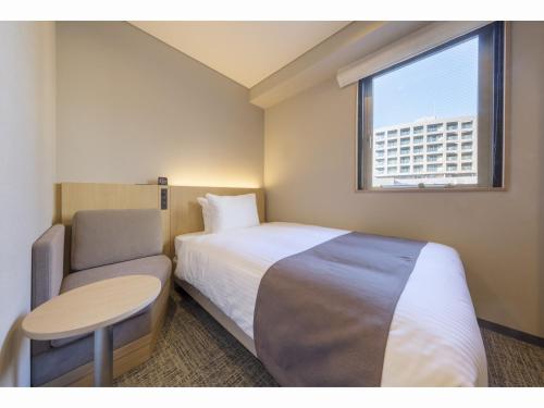 En eller flere senge i et værelse på Almont Inn Shonan Fujisawa