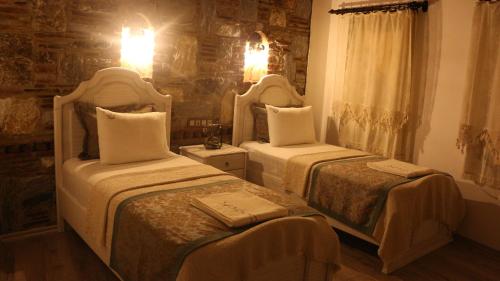 Celsus Boutique Hotelにあるベッド