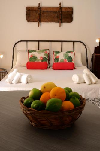 Postel nebo postele na pokoji v ubytování Be Ortigia