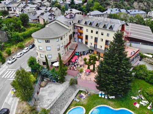 an aerial view of a building with a group of people at Hotel Cardós in Ribera de Cardós