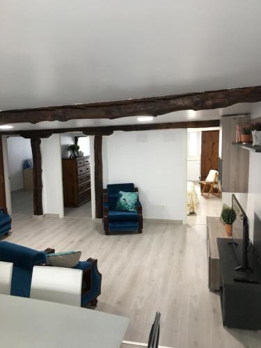 a living room with two chairs and a couch at Castro Sun And Beach in Castro-Urdiales