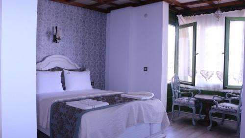 Celsus Boutique Hotelにあるベッド