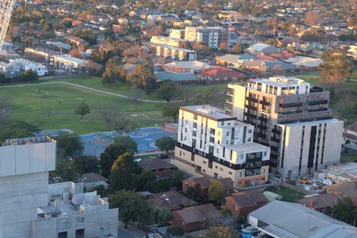 an aerial view of a city with buildings at Whitehorse Towers Self Service Holiday Apartment in Box Hill