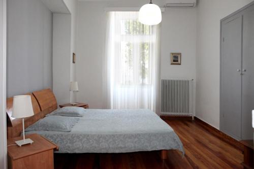 Postel nebo postele na pokoji v ubytování Poplar Mansion