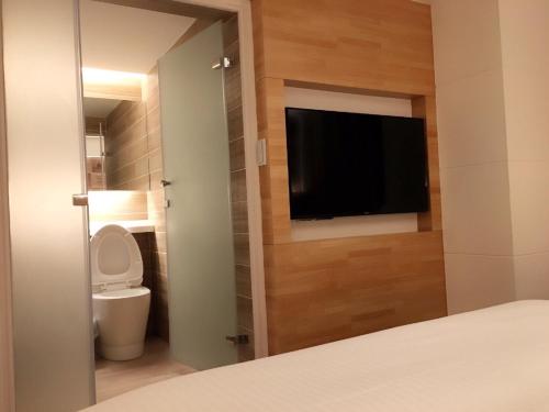 Tempat tidur dalam kamar di Honey Prince