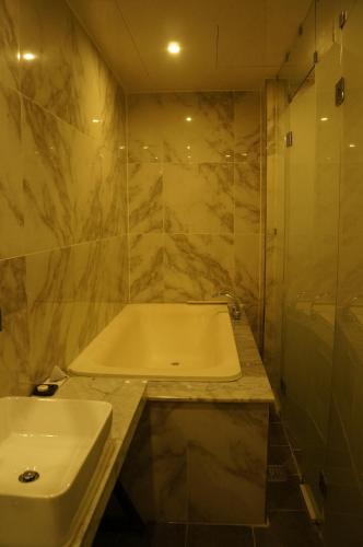 Koupelna v ubytování SOYU Hotel