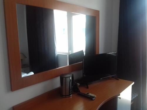 Televisyen dan/atau pusat hiburan di Alexandrov Residence Studio
