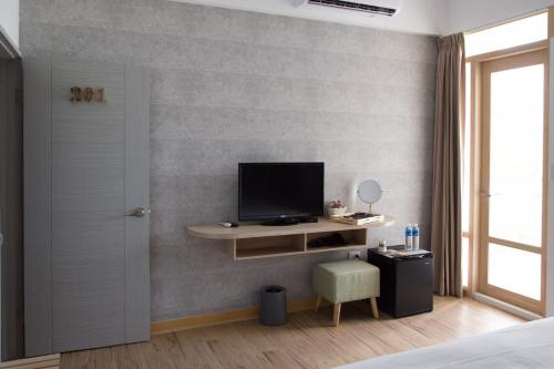 TV a/nebo společenská místnost v ubytování Foresweet B&B
