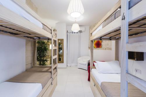 Postel nebo postele na pokoji v ubytování Two Pillows Boutique Hostel