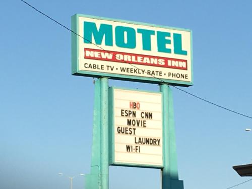 a sign for a modified new car dealership at New Orleans Inn in New Orleans