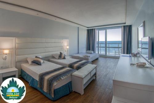 Postel nebo postele na pokoji v ubytování Hotel Villa List