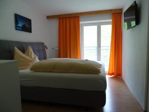 Llit o llits en una habitació de Apart Tyrol