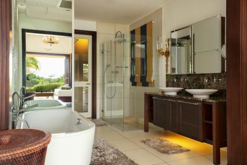 A bathroom at Eden Island Luxury Villa 235 by White Dolphin LLC