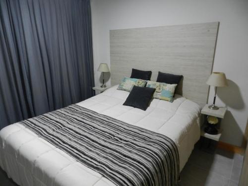 Ένα ή περισσότερα κρεβάτια σε δωμάτιο στο Umain