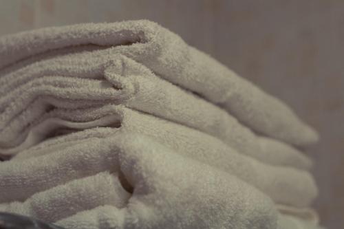 a close up of a pile of white towel at Casa Arboleda in Ezcaray