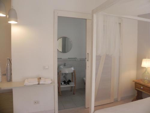 A bathroom at Gea Apartment Etna