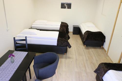 Postel nebo postele na pokoji v ubytování Dettifoss Guesthouse