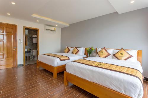 Cama o camas de una habitación en Hoi An Vi Khoa Villa