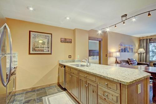 a kitchen with a sink and a counter top at Mountain Thunder M1101 in Breckenridge