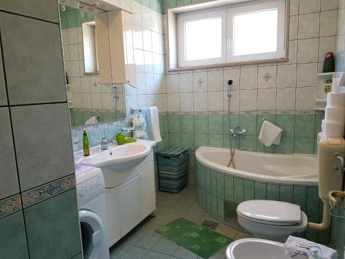 Kúpeľňa v ubytovaní Apartman Iskra