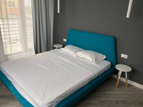 Säng eller sängar i ett rum på Brand new luxurios loft by the sea
