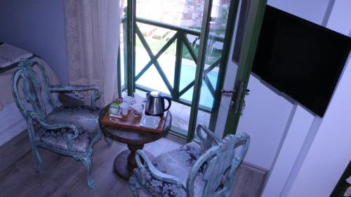 Celsus Boutique Hotelにあるテレビまたはエンターテインメントセンター