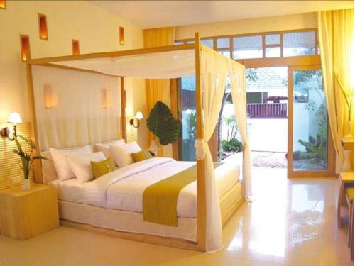 Postel nebo postele na pokoji v ubytování Mercure Koh Chang Hideaway