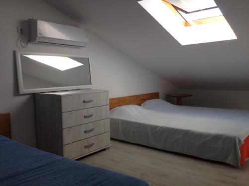 Postel nebo postele na pokoji v ubytování Apartment SM