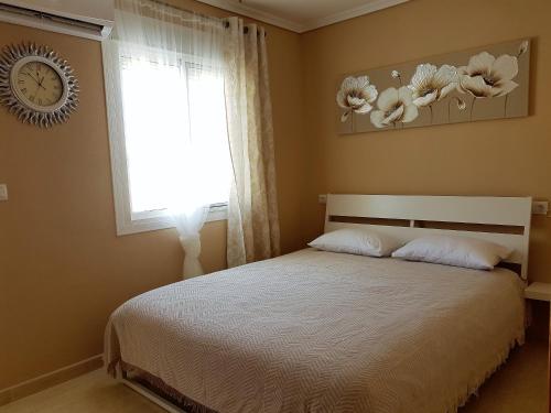 En eller flere senge i et værelse på Globus Gran Alacant