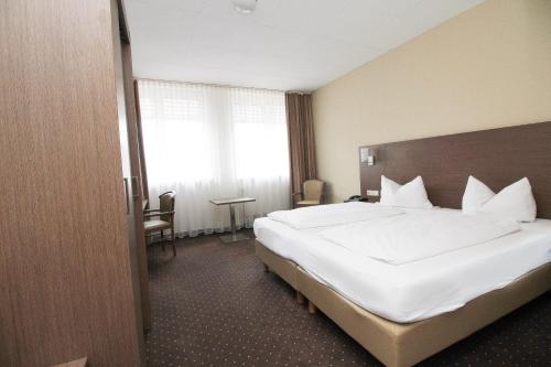 Katil atau katil-katil dalam bilik di Hotel Berliner Ring