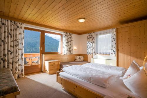 Postel nebo postele na pokoji v ubytování Grübelspitz