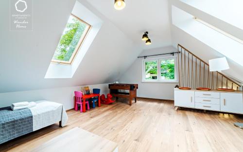 Ένα ή περισσότερα κρεβάτια σε δωμάτιο στο Wonder Home - Domki górskie na kameralnym osiedlu Karkonoska Opoka