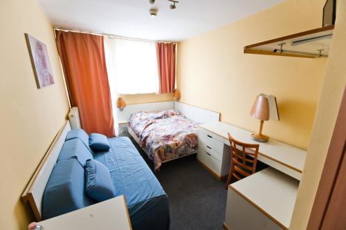 Кровать или кровати в номере Hostel Malinowski City