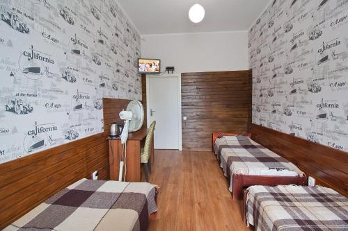 Ένα ή περισσότερα κρεβάτια σε δωμάτιο στο Tsentr Hostel