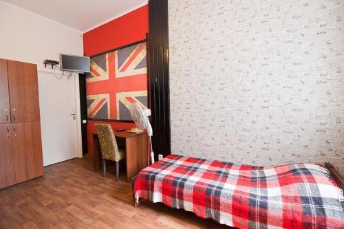 Ένα ή περισσότερα κρεβάτια σε δωμάτιο στο Tsentr Hostel
