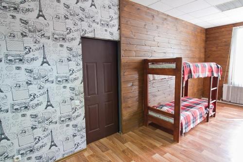 Ένα ή περισσότερα κρεβάτια σε δωμάτιο στο Tsentr Hostel