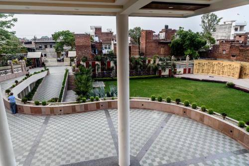 Zahrada ubytování Konark Grand Hotel