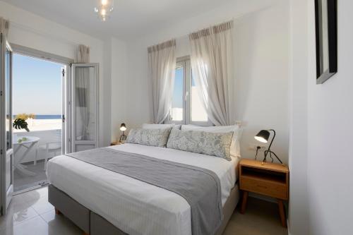 Ліжко або ліжка в номері Tramonto Private Villa
