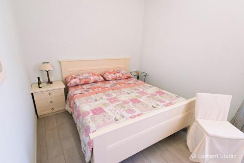 Ein Bett oder Betten in einem Zimmer der Unterkunft Piccolo Albergo del Musicista