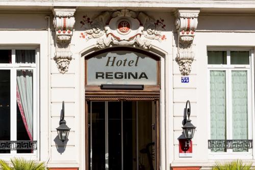 a hotel sign over the door of a building at Citotel Le Regina Bordeaux Gare Saint-Jean in Bordeaux