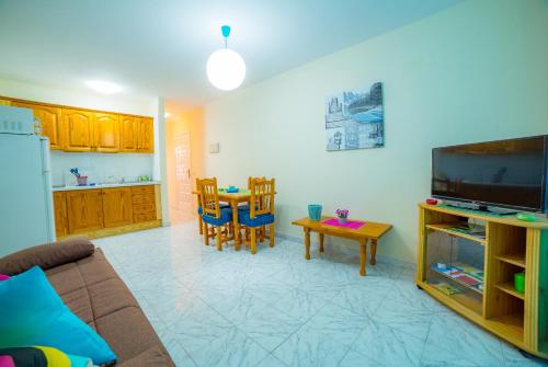 Η κουζίνα ή μικρή κουζίνα στο Apartamento Positive