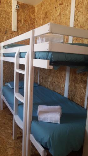 a bunk bed or bunk beds in a room at Parque de Campismo da Praia da Barra in Gafanha da Nazaré