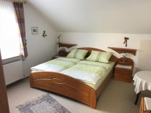 Postel nebo postele na pokoji v ubytování Haus Mittelberg