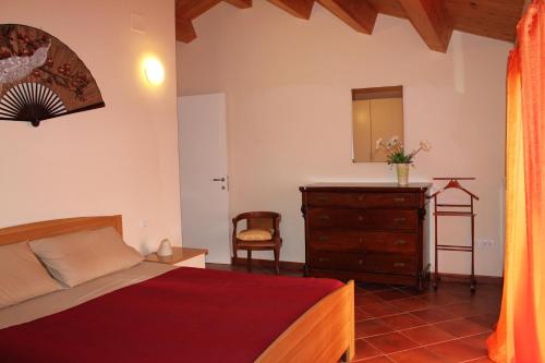 Palazzo Croce tesisinde bir odada yatak veya yataklar
