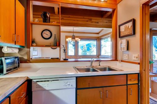 a kitchen with a sink and a counter top at Aspen Ridge Condominiums by Keystone Resort in Keystone