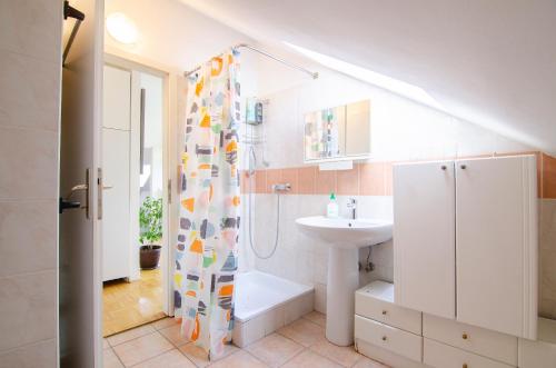 Koupelna v ubytování Apartments GreenSLO